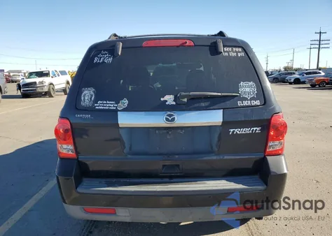 2010 Mazda Tribute I z USA, uszkodzony, nr VIN 4F2CY0C70AKM02556
